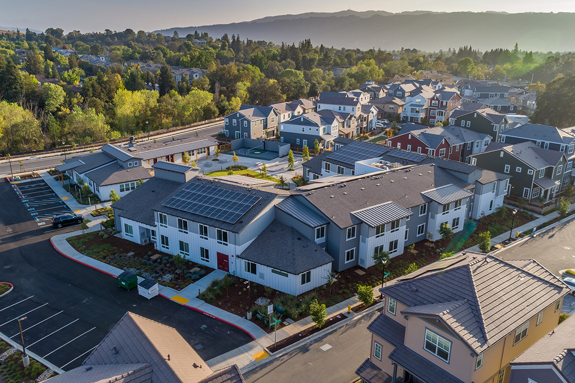 Aerial image of Sunflower Hill at Irby Ranch in Pleasanton, CA. This image was taken at sundown with long sweeping shadows and a bright sky as the sun sets of the mountains in the background.