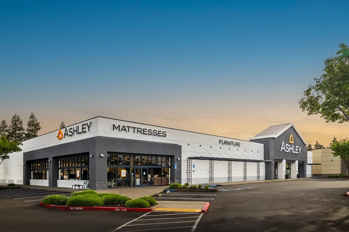 Exterior photo during twilight facing Ashley Furniture in Modesto