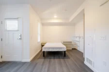 Bedroom and closet space inside a Lightfighter Village apartment unit
